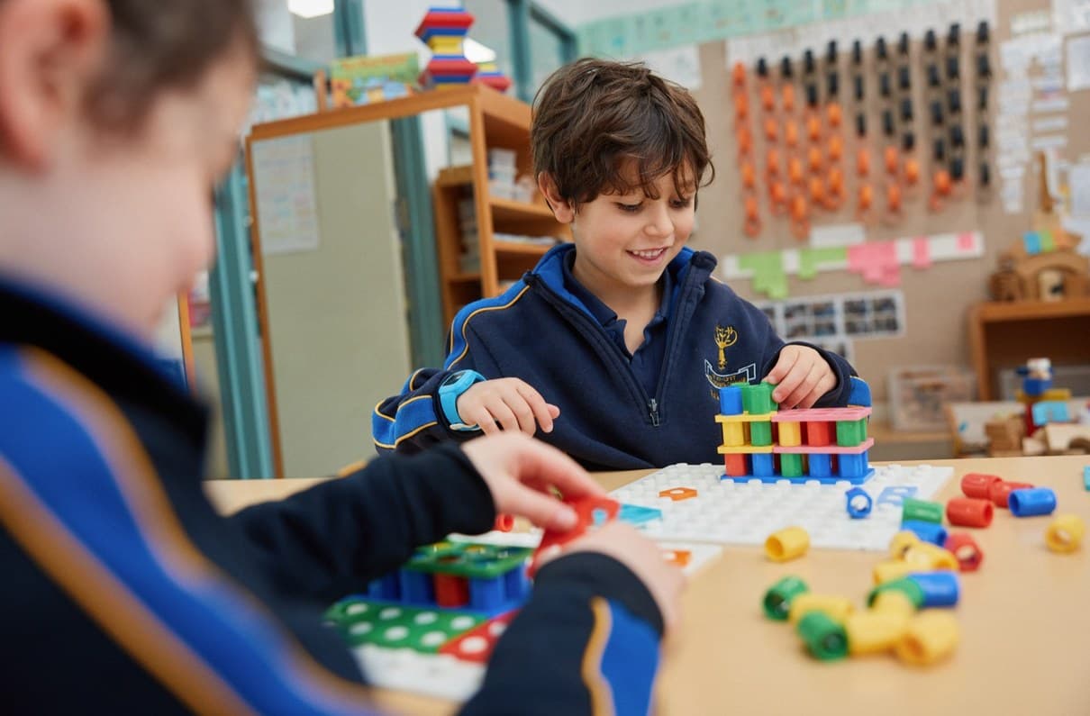 A student experimenting with test tubes in a science lesson