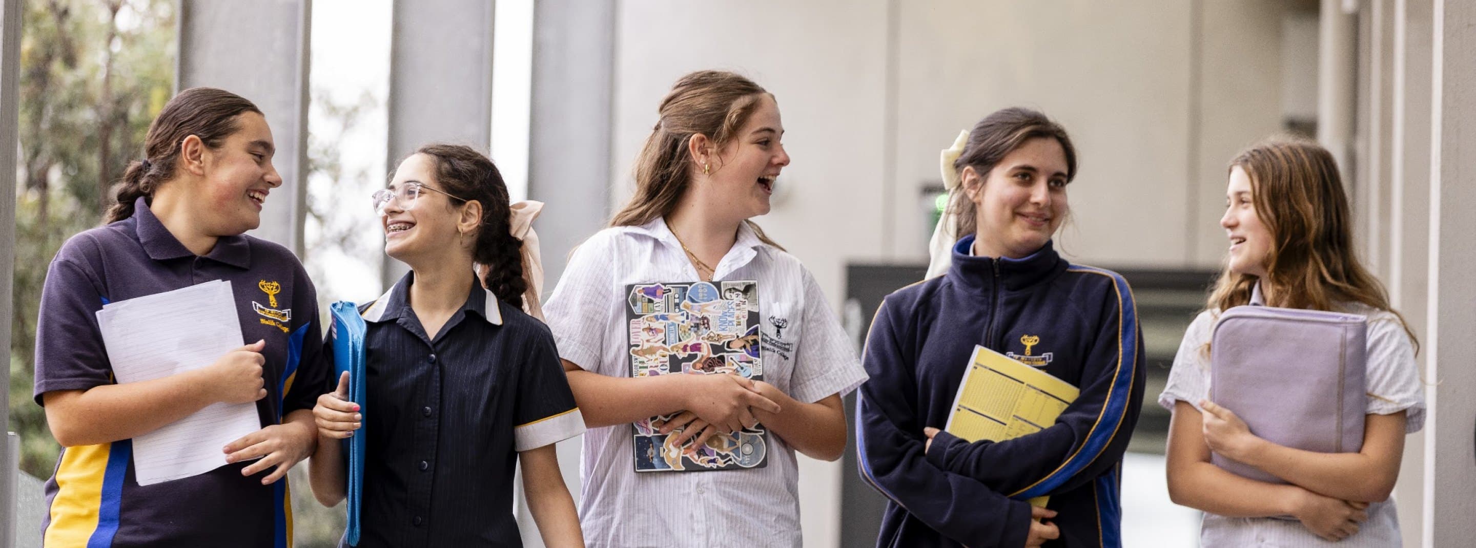 Bialik College students making heart shapes with their hands