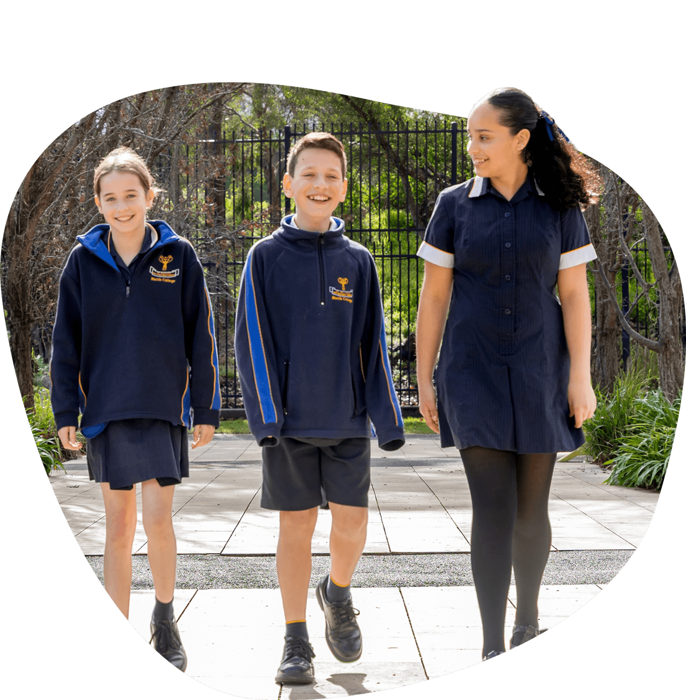 Three Bialik College students walking together through the school grounds